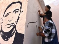 Belediyenin 11 yıllık temizlik işçisi Cizre'nin duvarlarını resimlerle süsledi