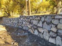 Beytüşşebap’ta Mezarlıklar Etrafına Taş Duvar Yapılıyor
